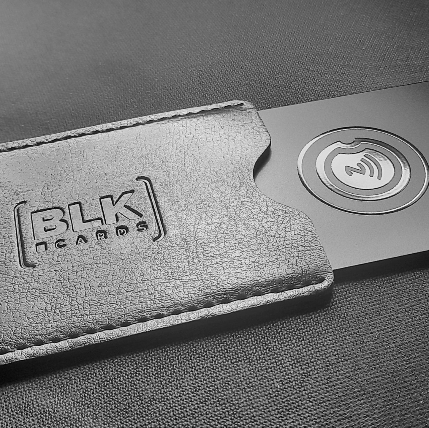 elegant black NFC card by BLK CARDS with card holder gift.