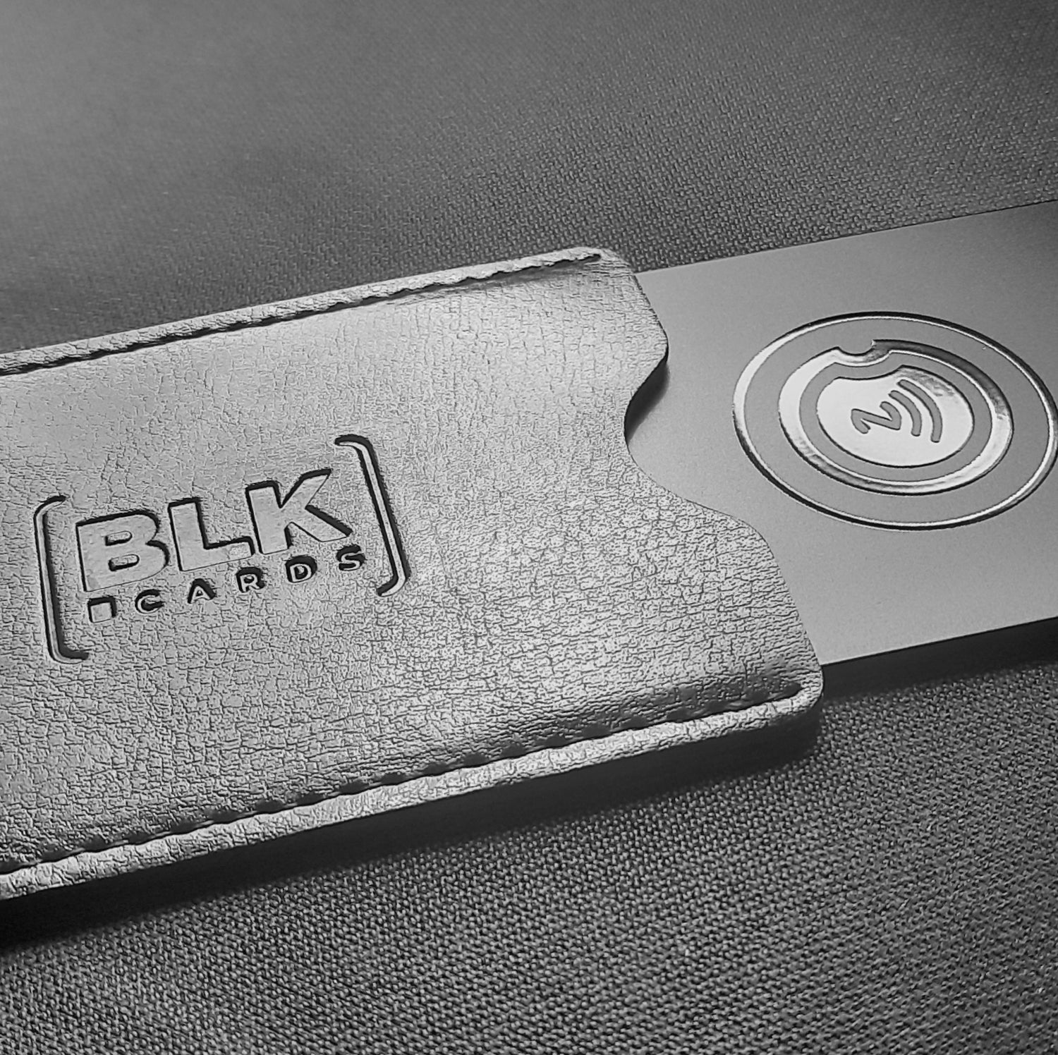 elegant black NFC card by BLK CARDS with card holder gift.